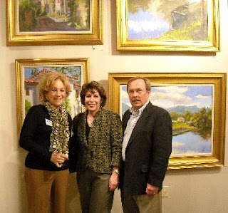 ... Winters (left) poses in fro...